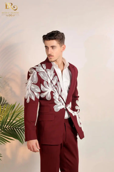 maroon-colored suit with white embroidery