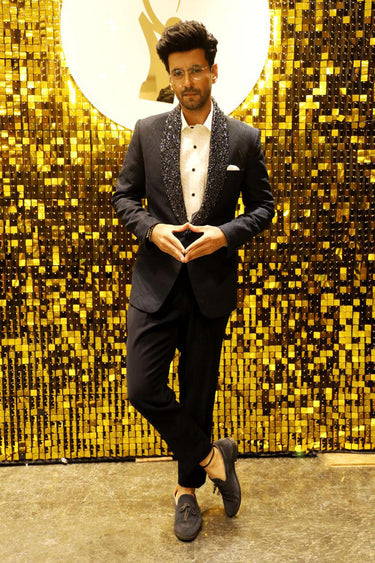 KARANVIR SHARMA in Our blue blazer with stone embellishment on the collar - Bharat Reshma