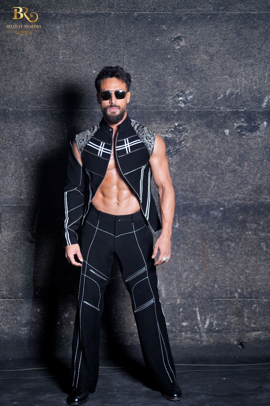 Tiger Shroff Wearing Our Statement Black Jacket Featuring One Sleeve Detail