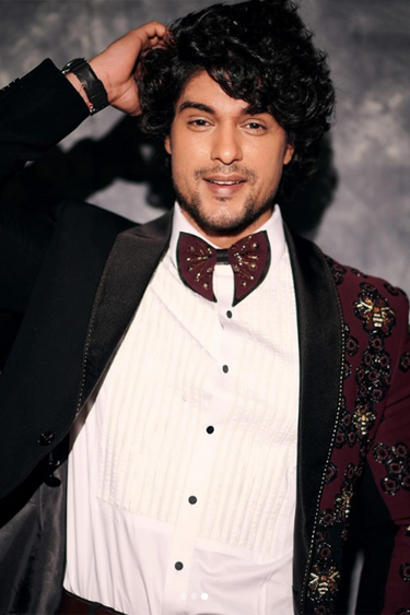 ANKIT GUPTA in Our Rich black textured suit with honeybee embroidered motifs - Bharat Reshma