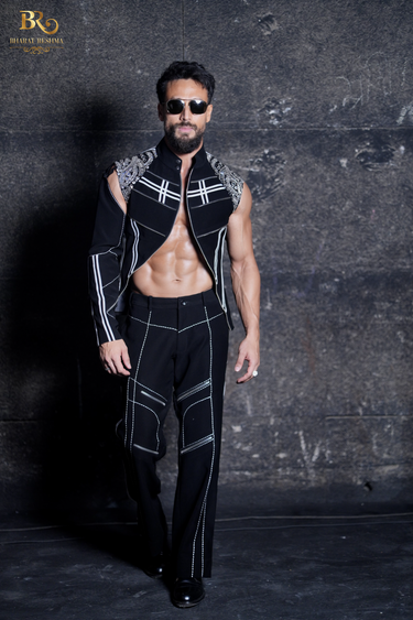Tiger Shroff Wearing Our Statement Black Jacket Featuring One Sleeve Detail - Bharat Reshma
